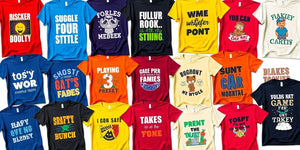 Colourful funny t-shirts with humorous designs displayed together.