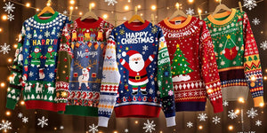 Colourful Christmas jumpers on a clothesline with lights.