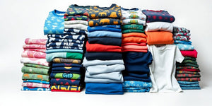 Colourful T-shirts displayed on a white background.