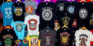 Colourful music-themed t-shirts arranged visually appealing.