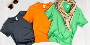 Loose fit t-shirt in seasonal colours on textured surface.