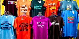 Colourful funny T-shirts on display for brothers.