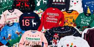 Colourful Christmas jumpers in festive designs.