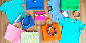 Colourful upcycled t-shirts made into trendy accessories.