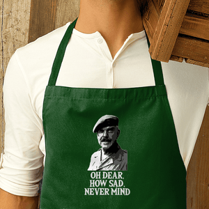 aprons from lion legion green apron with white MEME text